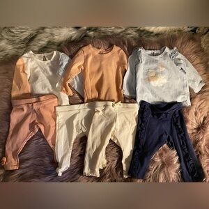 3 Primark outfits. 4 pairs of pants and 3 long sleeve shirts size 0-3 months